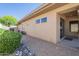 Exterior view showcases low-maintenance landscaping with native rocks and drought-resistant desert flora at 7438 E Visao Dr, Scottsdale, AZ 85266