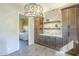 The laundry room with built-in cabinets and countertop space near the kitchen at 7438 E Visao Dr, Scottsdale, AZ 85266