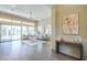 Bright and airy living room with sliding glass doors and contemporary furnishings at 7438 E Visao Dr, Scottsdale, AZ 85266