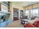 Cozy lobby with a fireplace, comfortable seating, and elegant decor at 7438 E Visao Dr, Scottsdale, AZ 85266