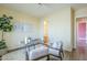 Comfortable office featuring seating, desk, and view of a doorway and hall at 7438 E Visao Dr, Scottsdale, AZ 85266