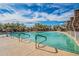 Sparkling community pool featuring lap lanes, clear blue water, and desert landscaping at 7438 E Visao Dr, Scottsdale, AZ 85266