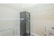Spacious walk-in closet with metal shelving and large black safe at 7438 E Visao Dr, Scottsdale, AZ 85266