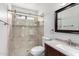 Bathroom featuring a glass enclosed shower, modern sink, and tile flooring at 8157 W Mclellan Rd, Glendale, AZ 85303