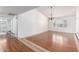 Bright living room featuring hardwood floors, recessed lighting, and large window at 8157 W Mclellan Rd, Glendale, AZ 85303