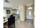 An elegant dining area that transitions into a modern kitchen at 9001 W Windsor Ave, Phoenix, AZ 85037