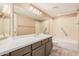 This bathroom features a bathtub and a large counter with a single sink at 9151 W Greenway Rd # 212, Peoria, AZ 85381