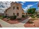 Charming two-story condo with red rock landscaping at 9151 W Greenway Rd # 212, Peoria, AZ 85381