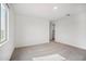 Bright bedroom features carpeted floors and a window at 9533 W Luxton Ln, Tolleson, AZ 85353