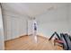 Bedroom with hardwood floors, closet and natural light at 9851 N 28Th Way, Phoenix, AZ 85028