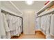 Spacious walk-in closet with built-in shelving and ample storage for clothing and accessories at 9851 N 28Th Way, Phoenix, AZ 85028