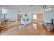 Bright, open living room with hardwood floors and natural light leading into a kitchen at 9851 N 28Th Way, Phoenix, AZ 85028