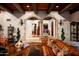 Elegant living room featuring classic furniture, arched entryways, and sophisticated decor at 1015 W Encanto Blvd, Phoenix, AZ 85007