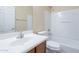 Bathroom featuring single sink vanity, and a shower-tub combo with tile surround at 10324 W Sands Dr # 476, Peoria, AZ 85383
