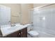 Bathroom with a shower-tub combo, single sink vanity, and a functional layout at 10324 W Sands Dr # 476, Peoria, AZ 85383