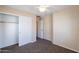 Bedroom featuring a closet, carpet, and neutral walls for a calming atmosphere at 10324 W Sands Dr # 476, Peoria, AZ 85383