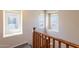 Staircase with carpet and wood railing at 10324 W Sands Dr # 476, Peoria, AZ 85383