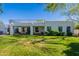 Expansive backyard featuring a spiral staircase leading to a rooftop deck, and lush green lawn at 10532 N 79Th St, Scottsdale, AZ 85258