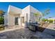 Backyard featuring a stainless steel grill, a patio, and a well manicured landscape at 10532 N 79Th St, Scottsdale, AZ 85258