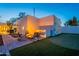 Backyard has a fire pit, seating, and putting green perfect for outdoor entertaining at 10532 N 79Th St, Scottsdale, AZ 85258