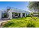Spacious backyard with a rooftop deck accessible by a spiral staircase, and an outdoor seating area at 10532 N 79Th St, Scottsdale, AZ 85258