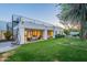 Spacious backyard with a rooftop deck accessible by a spiral staircase, and an outdoor seating area at 10532 N 79Th St, Scottsdale, AZ 85258
