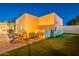 Backyard includes a cozy seating area with a fire pit and artificial turf putting green at 10532 N 79Th St, Scottsdale, AZ 85258