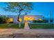 Charming home with a unique tree in the front yard, beautiful landscaping and an inviting entryway at 10532 N 79Th St, Scottsdale, AZ 85258