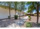 Inviting backyard features a stone walkway and pergola seating area at 1096 E Lodgepole Dr, Gilbert, AZ 85298