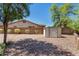 Backyard view with a storage shed and low-maintenance desert landscaping at 1096 E Lodgepole Dr, Gilbert, AZ 85298