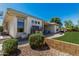 Well-maintained backyard features a playhouse, patio area, and lush lawn at 1096 E Lodgepole Dr, Gilbert, AZ 85298