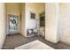 Welcoming front porch featuring a decorative door, a bench, and a 'Welcome Home' sign at 1096 E Lodgepole Dr, Gilbert, AZ 85298