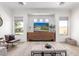 Cozy living room with a large media center, decorative vases, and comfortable seating, creating a relaxing atmosphere at 1096 E Lodgepole Dr, Gilbert, AZ 85298