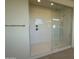 Bathroom featuring walk-in shower with glass enclosure and subway tile at 10984 N 164Th Dr, Surprise, AZ 85388