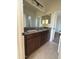 Modern bathroom featuring double sink vanity with granite countertop and tile flooring at 10984 N 164Th Dr, Surprise, AZ 85388
