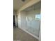 Walk-in shower with sleek glass enclosure and subway tile at 10984 N 164Th Dr, Surprise, AZ 85388