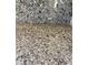 Close-up of a granite countertop with gray and black patterns, adding texture and sophistication to the kitchen or bathroom at 10984 N 164Th Dr, Surprise, AZ 85388