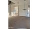 Living room featuring natural light and view into other rooms at 10984 N 164Th Dr, Surprise, AZ 85388
