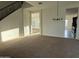 Spacious living room featuring staircase and lots of natural light at 10984 N 164Th Dr, Surprise, AZ 85388