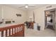 Bedroom featuring a desk, bed, and hallway access to another room at 1146 E Rovey Ave, Phoenix, AZ 85014