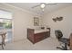 Bright bedroom features a twin daybed with storage, and a desk at 1146 E Rovey Ave, Phoenix, AZ 85014