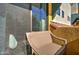 Relaxing balcony space with stylish outdoor chair and colorful exterior building details at 123 N Washington St # 16, Chandler, AZ 85225