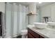 Bathroom featuring granite counters, vessel sink, and a shower tub with white subway tile at 123 N Washington St # 16, Chandler, AZ 85225