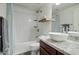 Bathroom featuring granite counters, vessel sink, and a shower tub with white subway tile at 123 N Washington St # 16, Chandler, AZ 85225