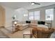 Spacious living room featuring a comfortable sectional, stylish furnishings, and plenty of natural light at 123 N Washington St # 16, Chandler, AZ 85225