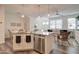 Bright living space featuring an open-concept design with a modern kitchen, dining area, and comfortable seating at 123 N Washington St # 16, Chandler, AZ 85225