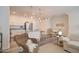 Open living space featuring a kitchen with an island, dining area, and comfortable seating at 123 N Washington St # 16, Chandler, AZ 85225