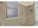 Modern tiled shower with shower head and convenient storage niche at 123 N Washington St # 16, Chandler, AZ 85225