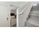 Bright entryway featuring a staircase with wood-look stairs and a view of the living room at 123 N Washington St # 16, Chandler, AZ 85225