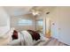 Bedroom with a sloped ceiling, ceiling fan, and a large closet at 12445 N 21St Ave # 4, Phoenix, AZ 85029